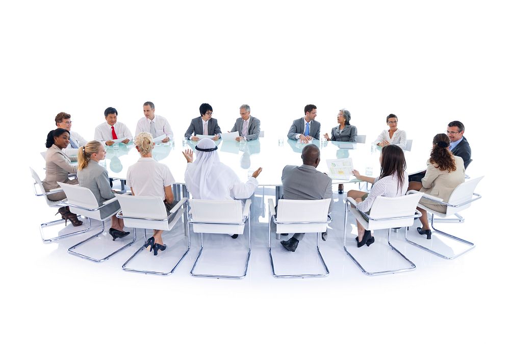 Business people in a board room meeting