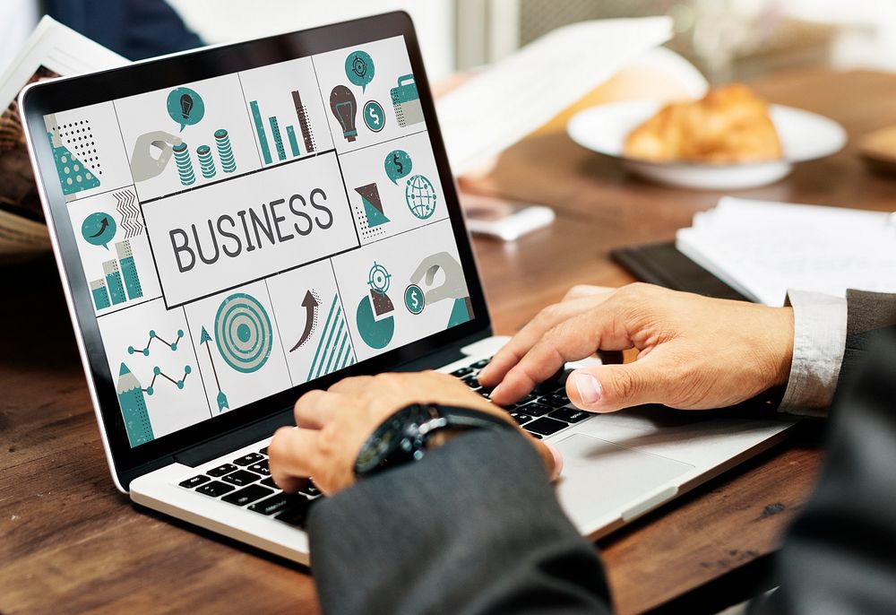 Illustration of financial marketing business plan on laptop