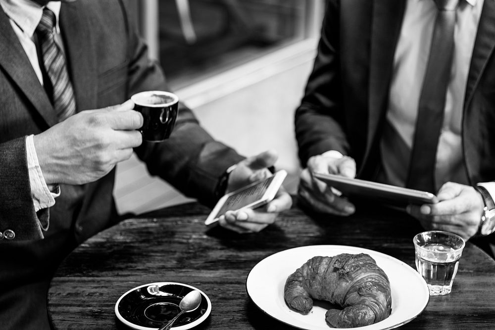 Two Businessmen Cafe Meeting Wireless Tablet Concept