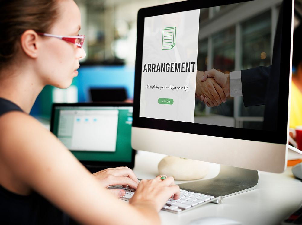 Arrangement word on business handshake background