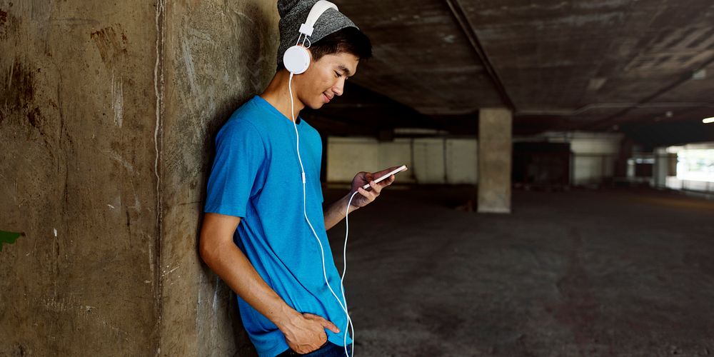 Teenager Style Listening Music Headphone Street Concept