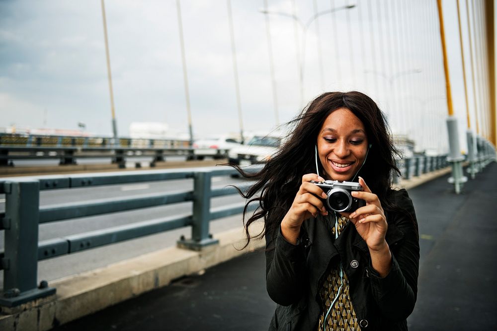African American woman is taking a photo