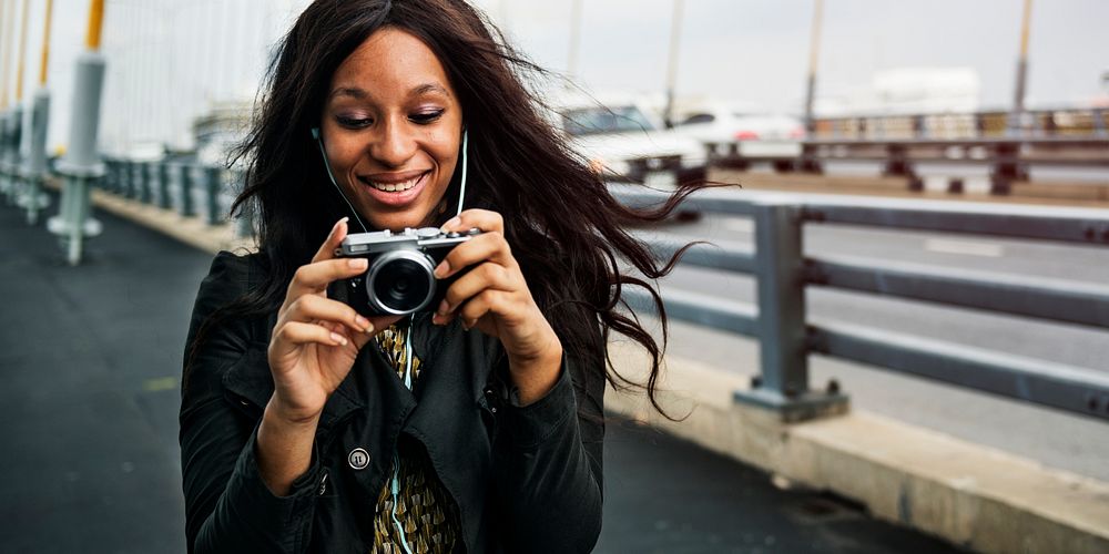 African American woman is taking a photo