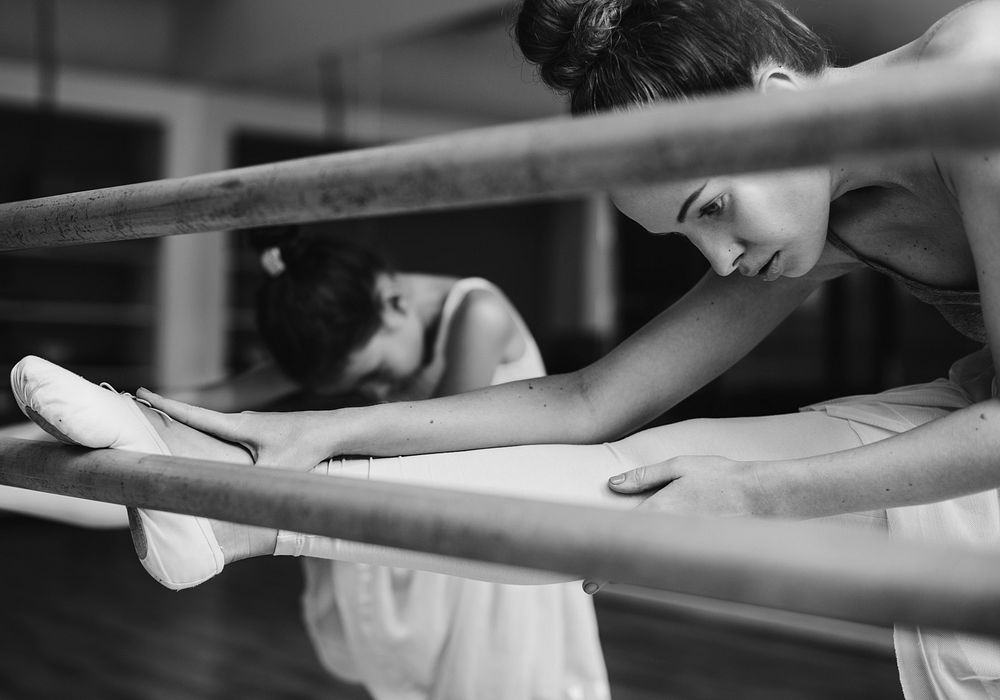 Girl ballerina with her teacher