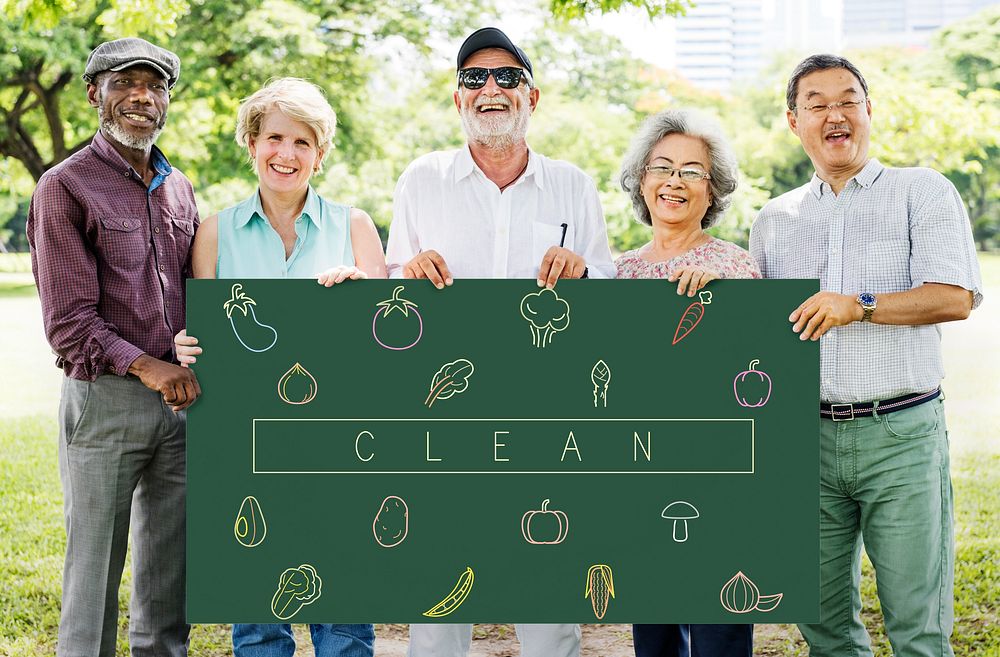 Group senior friends holding blackboard with vegetables icon