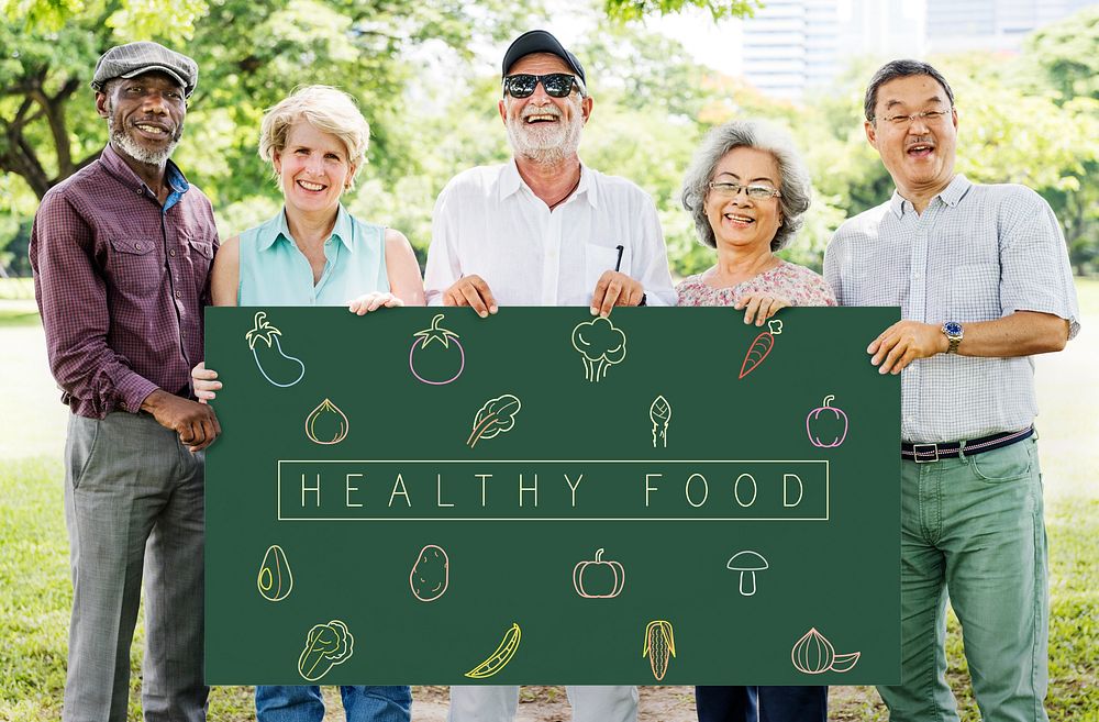 Group senior friends holding blackboard with vegetables icon