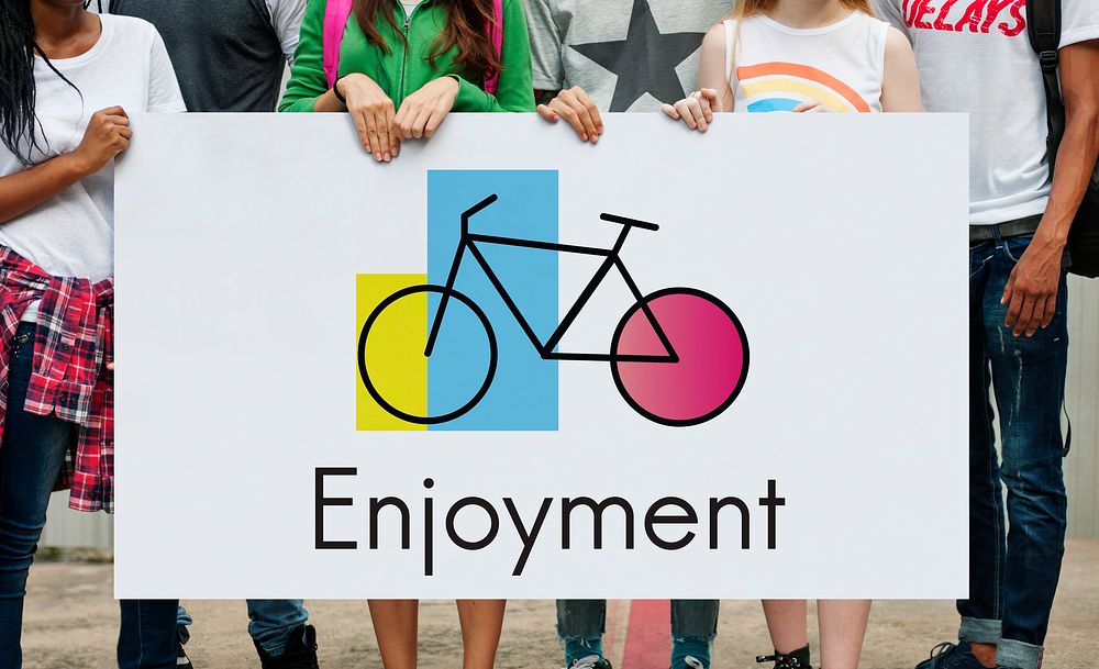 Group of teenagers holding a placard with an illustration of a bike