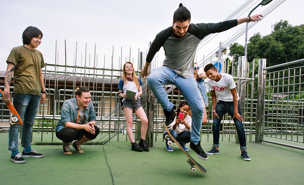 Diverse Group People Skateboard Park Concept