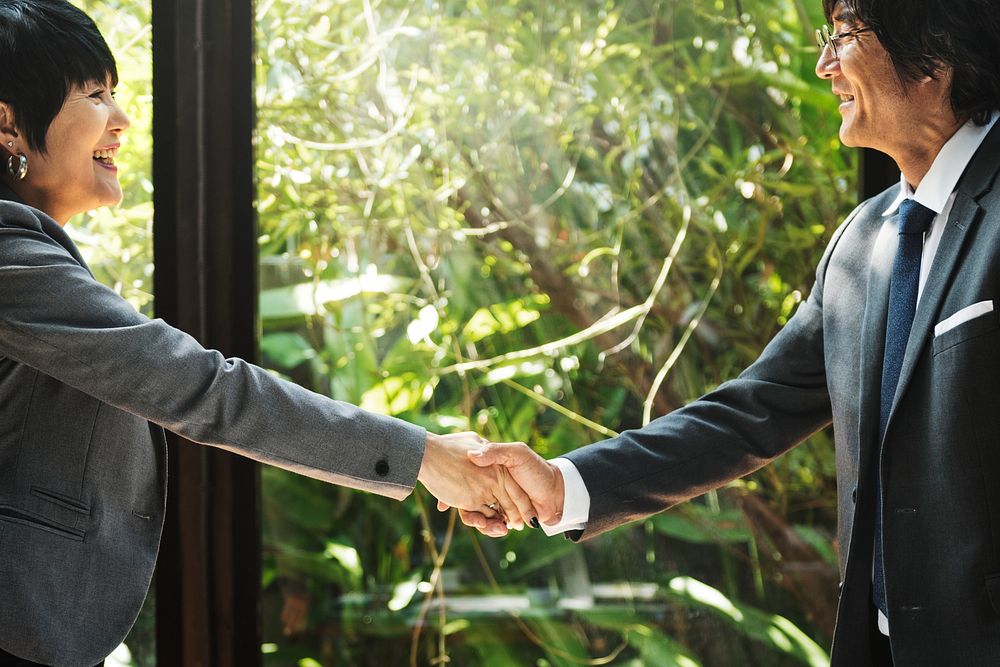 Business handshake in Asia