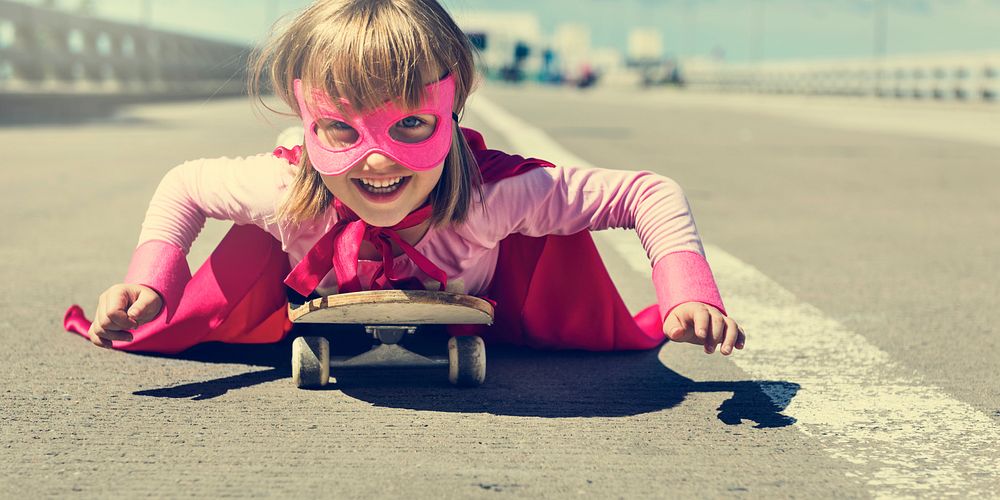 Little Girl Riding Skateboard Concept