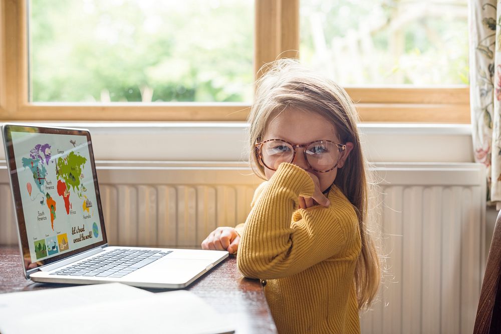 Little Girl Using Digital Laptop E-learning Concept