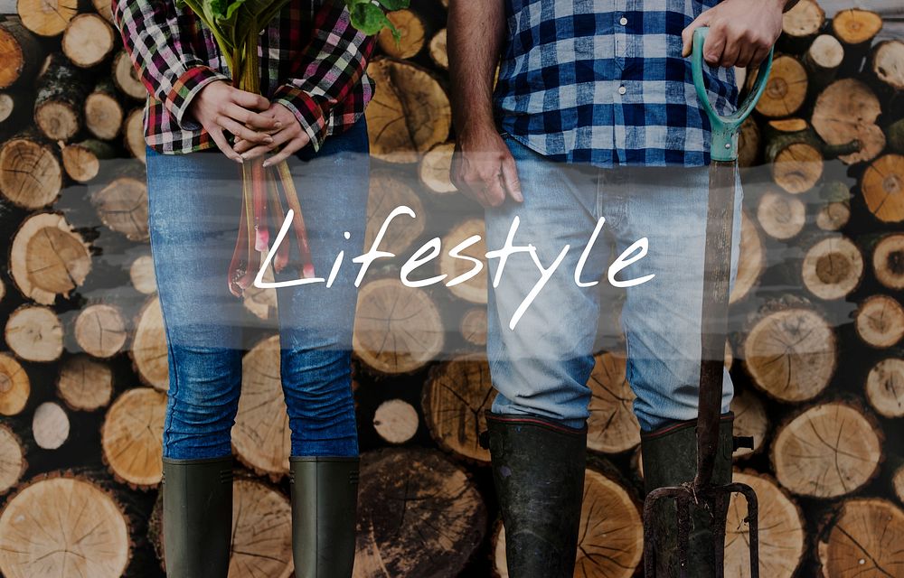 Lifestyle text overlay on a couple in front of chopped logs