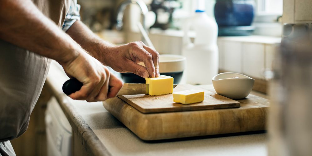 Man Mixing Butter Pastry Bakery Concept