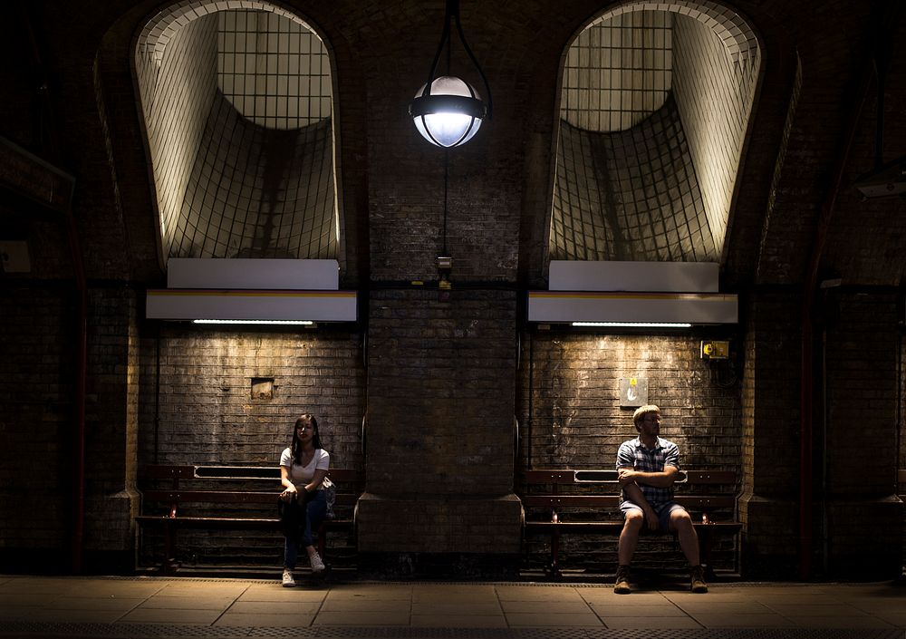 Man and woman on an underground passage
