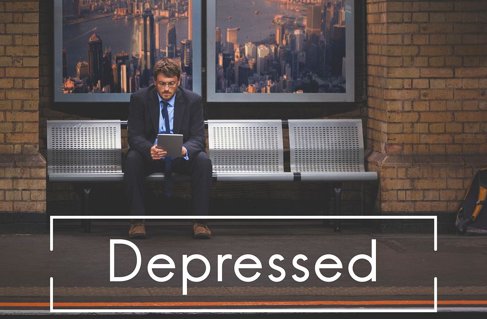Depressed text overlay on a guy on a bench