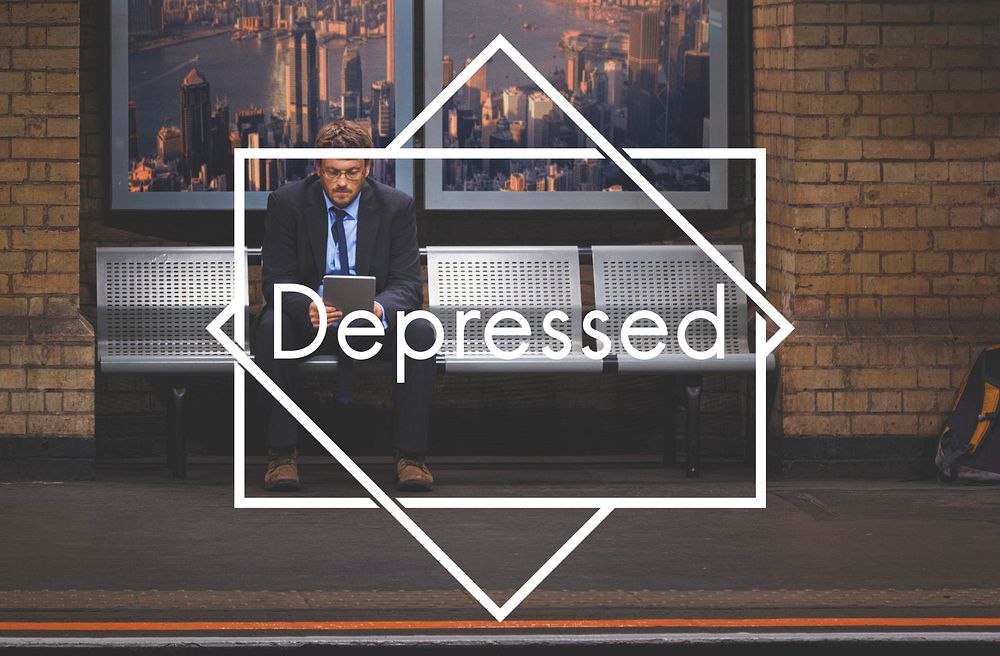 Depressed word overlaid on a business photo background