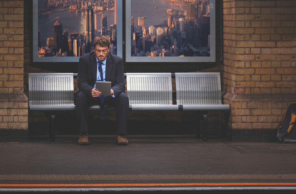 Businessman waiting in an underground train station