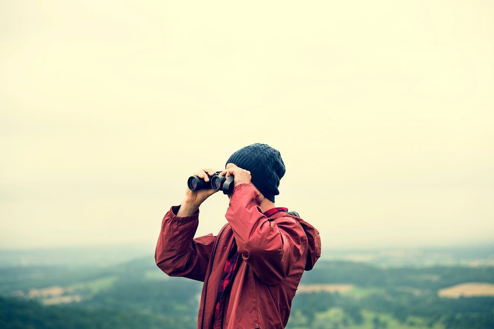 Man Binoculars Looking Mountain Cloudscape Traveling Concept