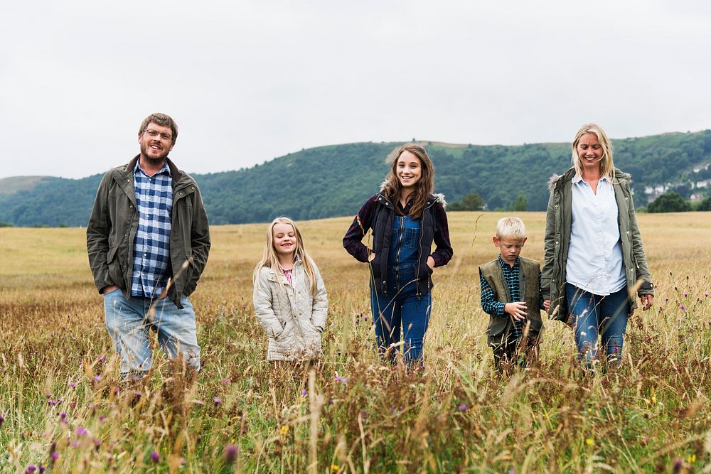 Family Walking Field Nature Togetherness Concept