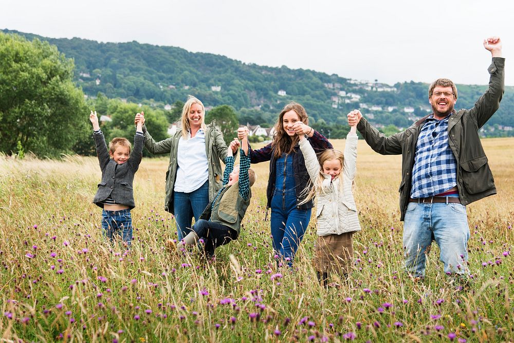 Family Walking Field Nature Togetherness Concept