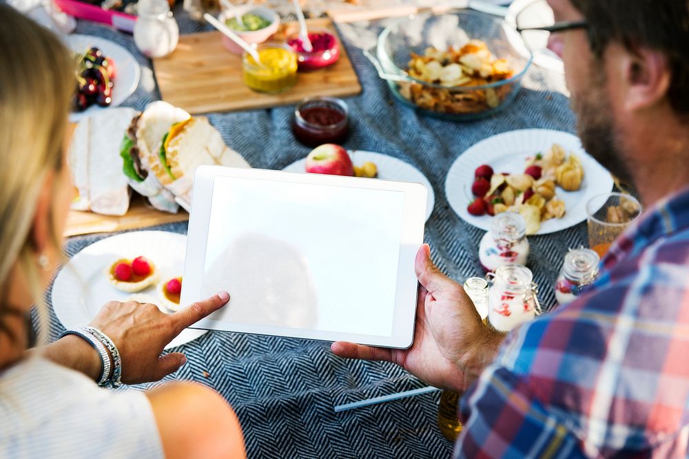 Happy family picnic in the park