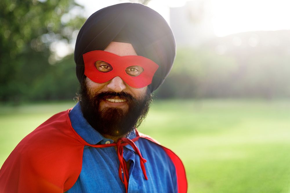 Senior superhero Sikh Indian man in the park