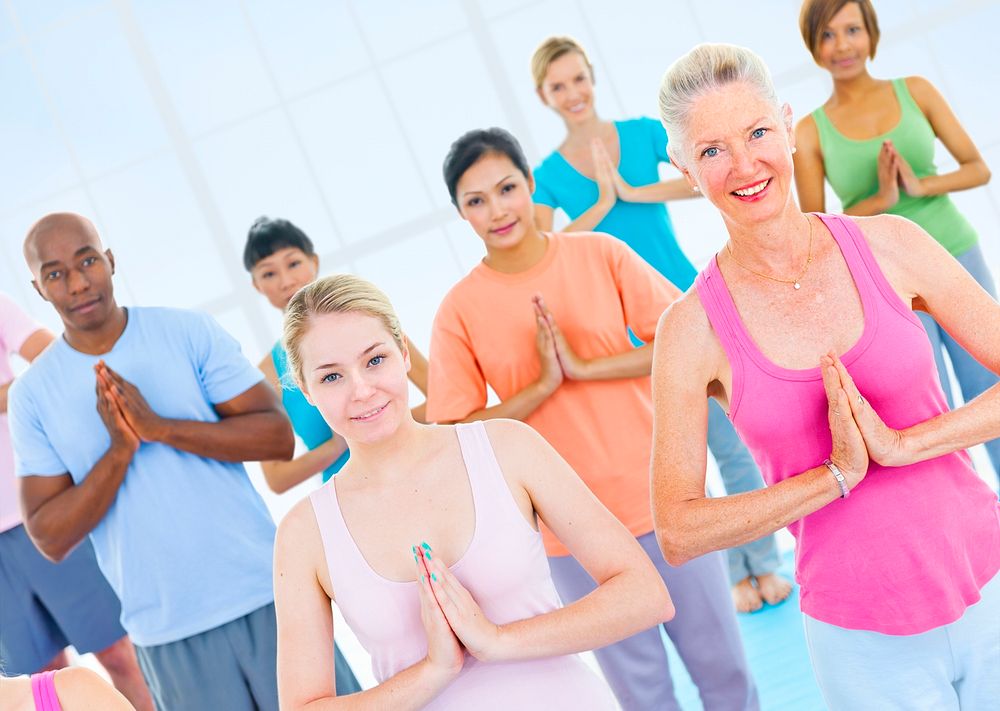 Diverse group of adults exercising 