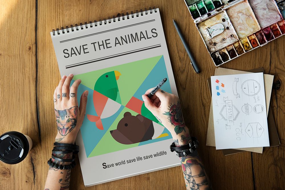 Tattooed woman with save the animals banner