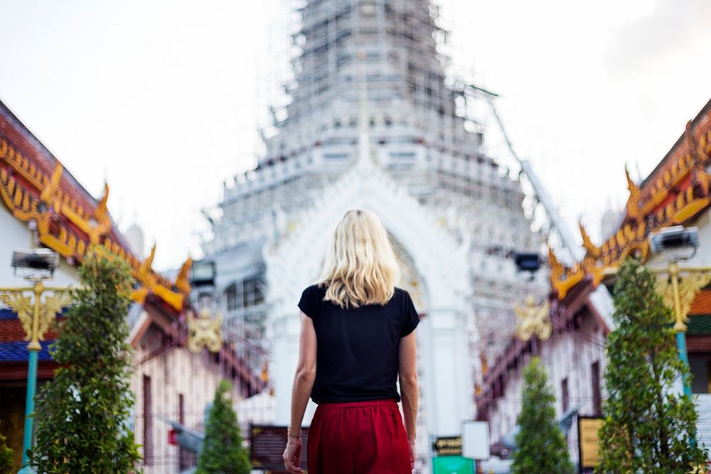 Rear view of traveler at Thai temple