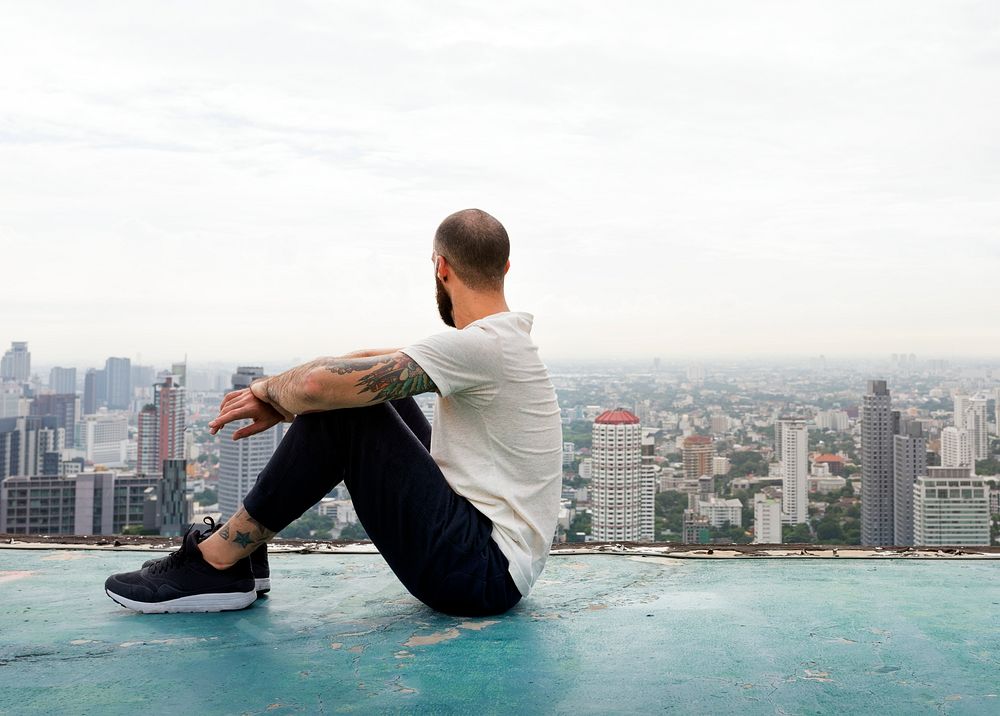 Man Sitting Rest Rooftop Concept