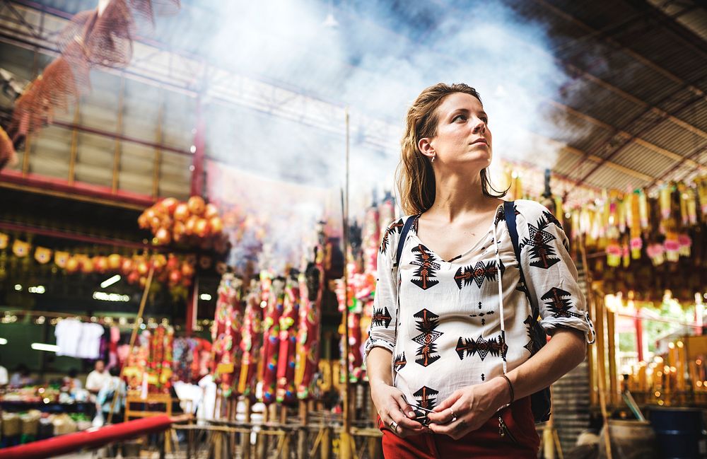 Solo female traveler in Asian temple