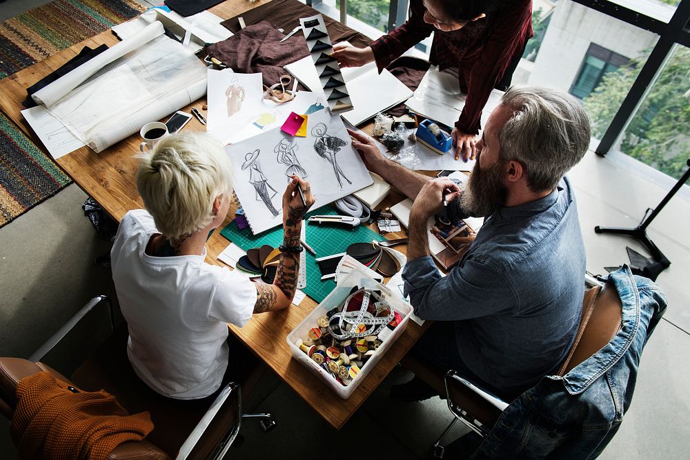 Fashion designers working together in a studio