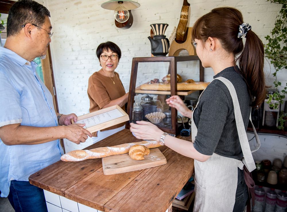 Small bakery business buying customer