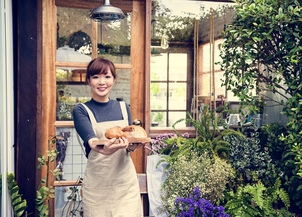 Young asian lady entrepreneur bakery garden