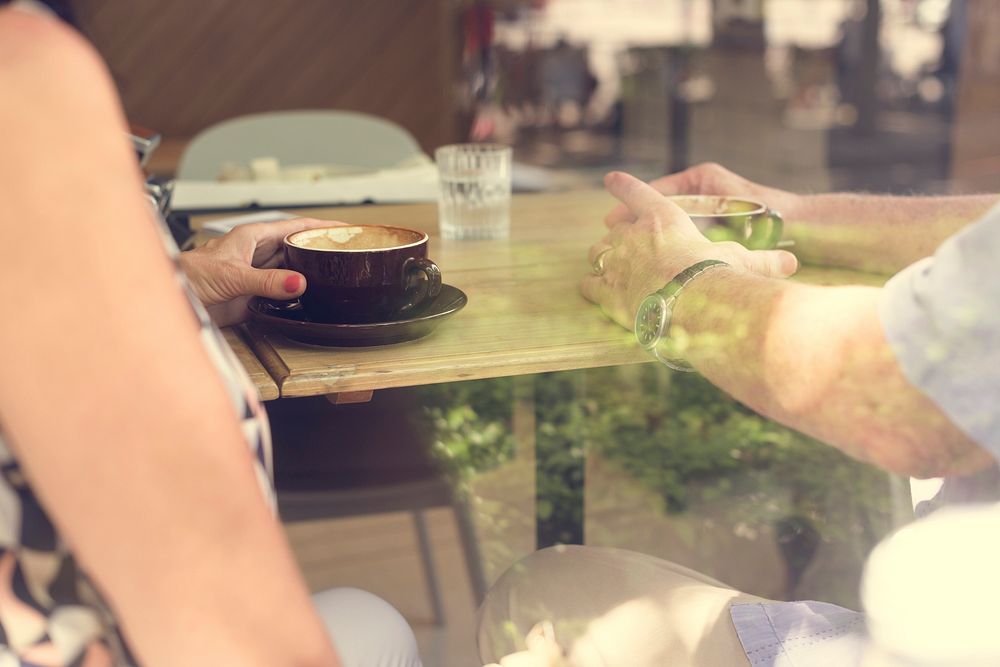 Mature couple enjoying coffee together