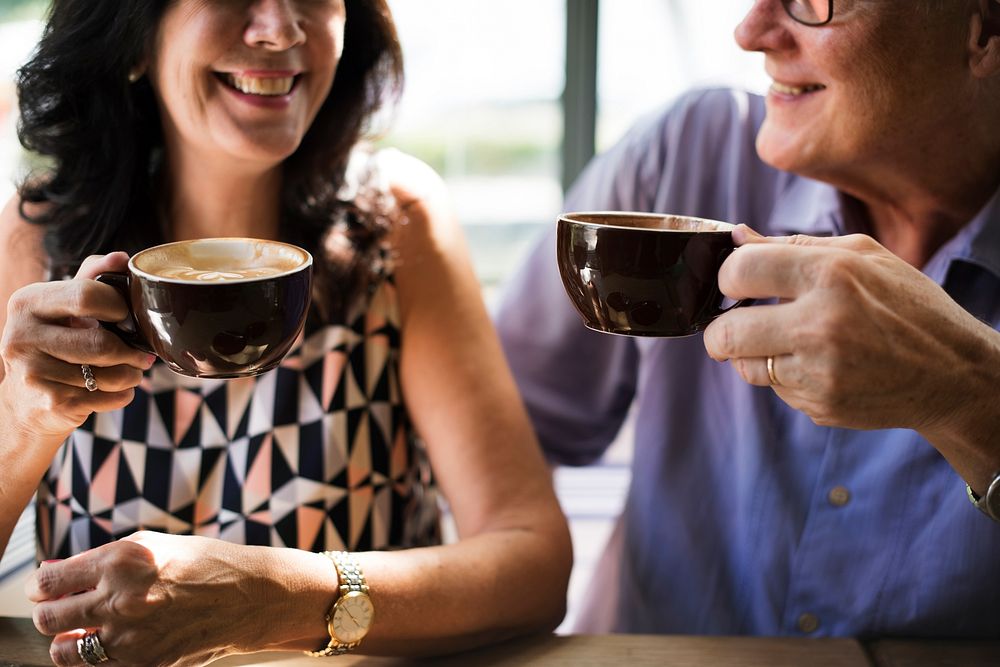 Mature couple enjoying coffee together