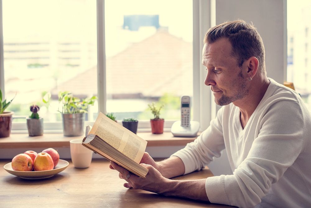 Man Reading Book Relax Home