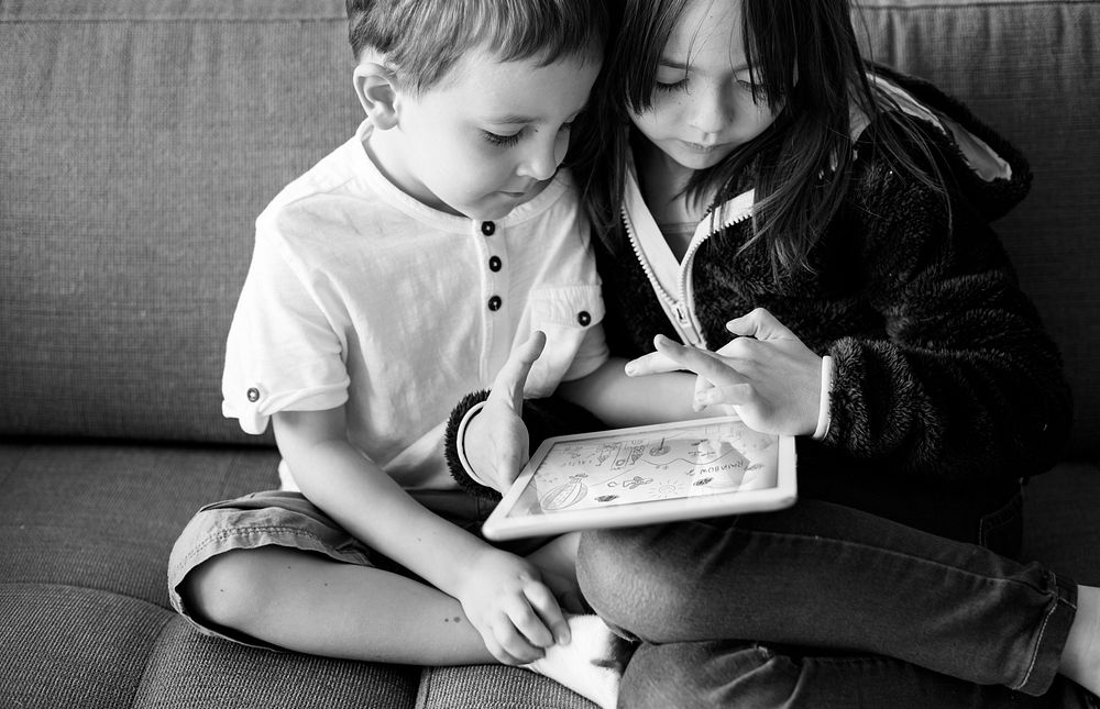 Sister Brother Playing Techie Digital Device