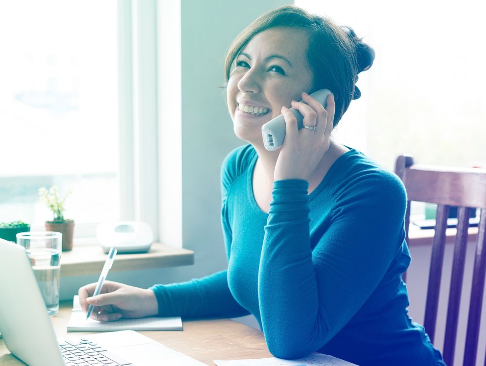 Adult Female Working Talking Writing Notes