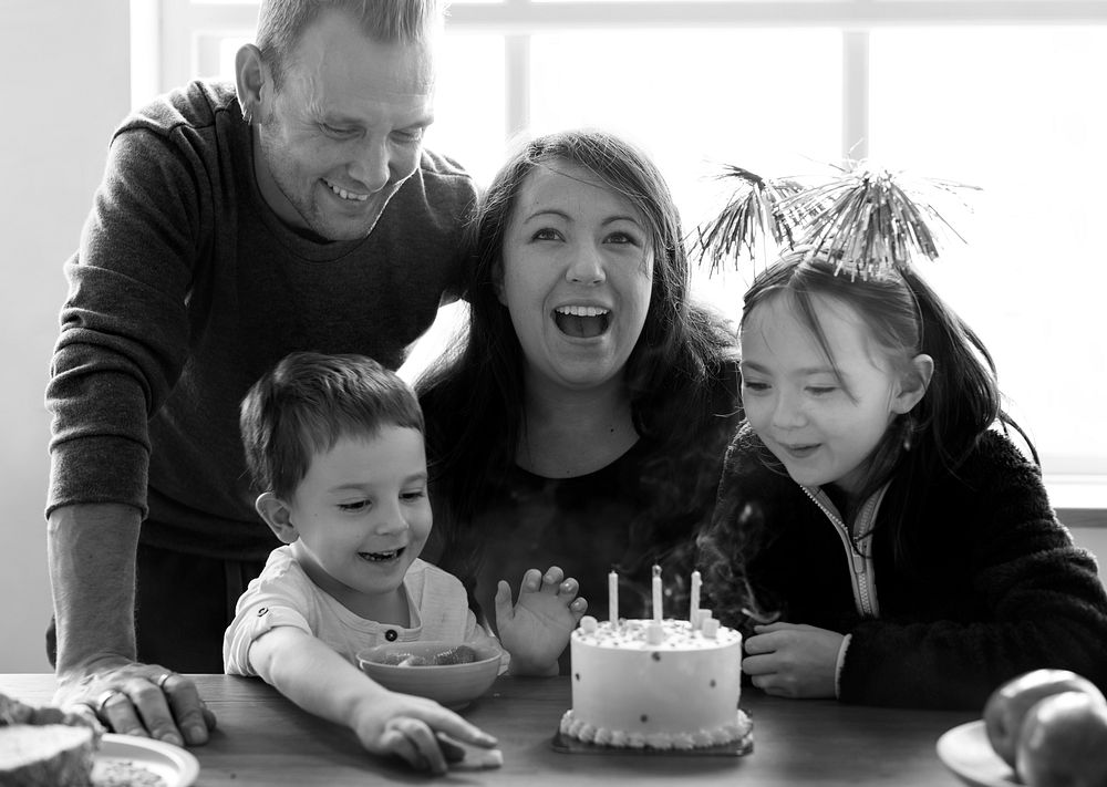 Cheerful family celebrating birthday