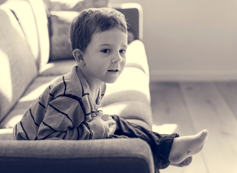 Little Boy Sitting Living Room