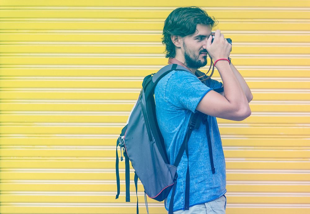 Photo Gradient Style with Man taking a photo yellow wall background