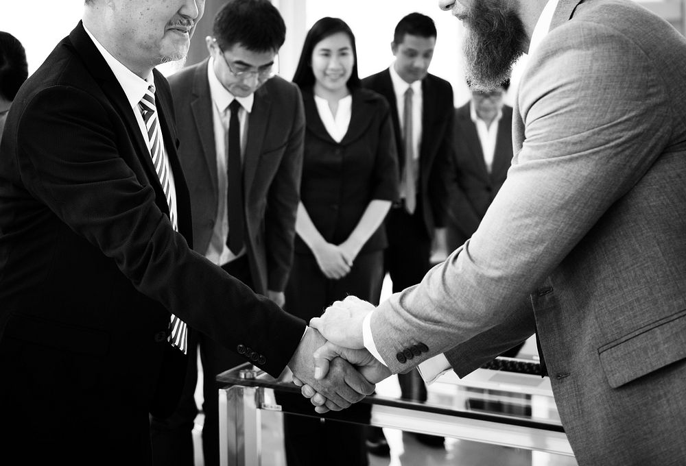 Corporate business people handshaking