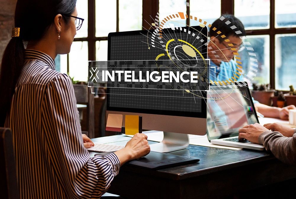 Business people working with laptop intelligence word graphic design