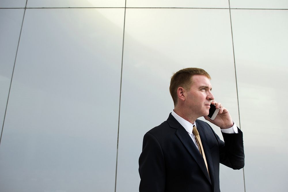 Businessman on the phone talking with someone