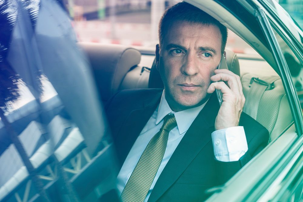 Photo Gradient Style with Businessman Talking Using Phone Car Inside
