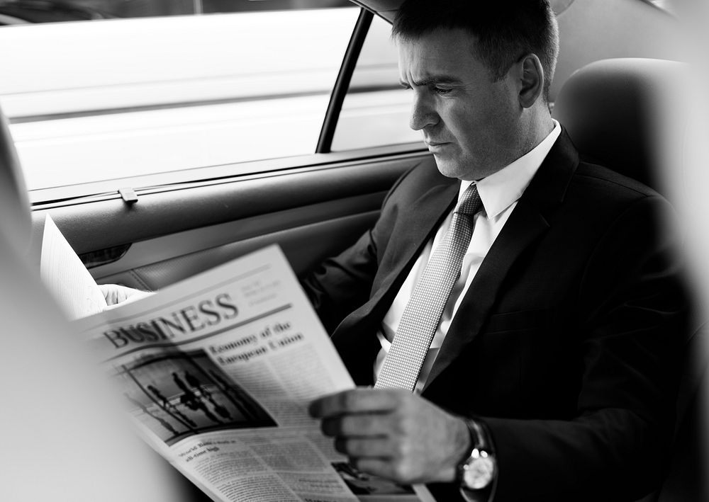 Businessman reading  the newspaper