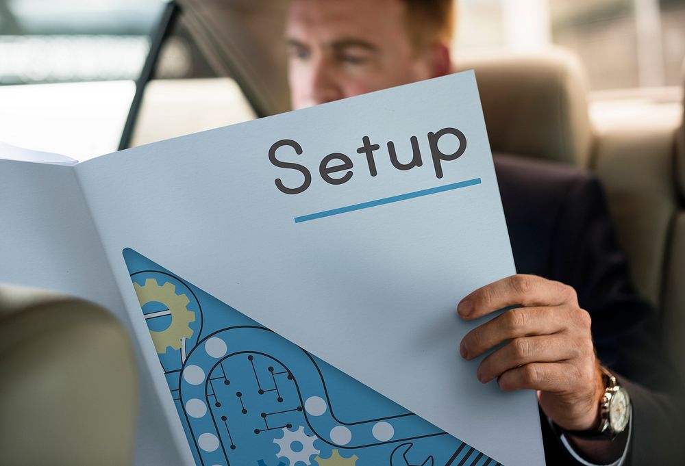 Entrepreneur reading neswpaper in the car setup word