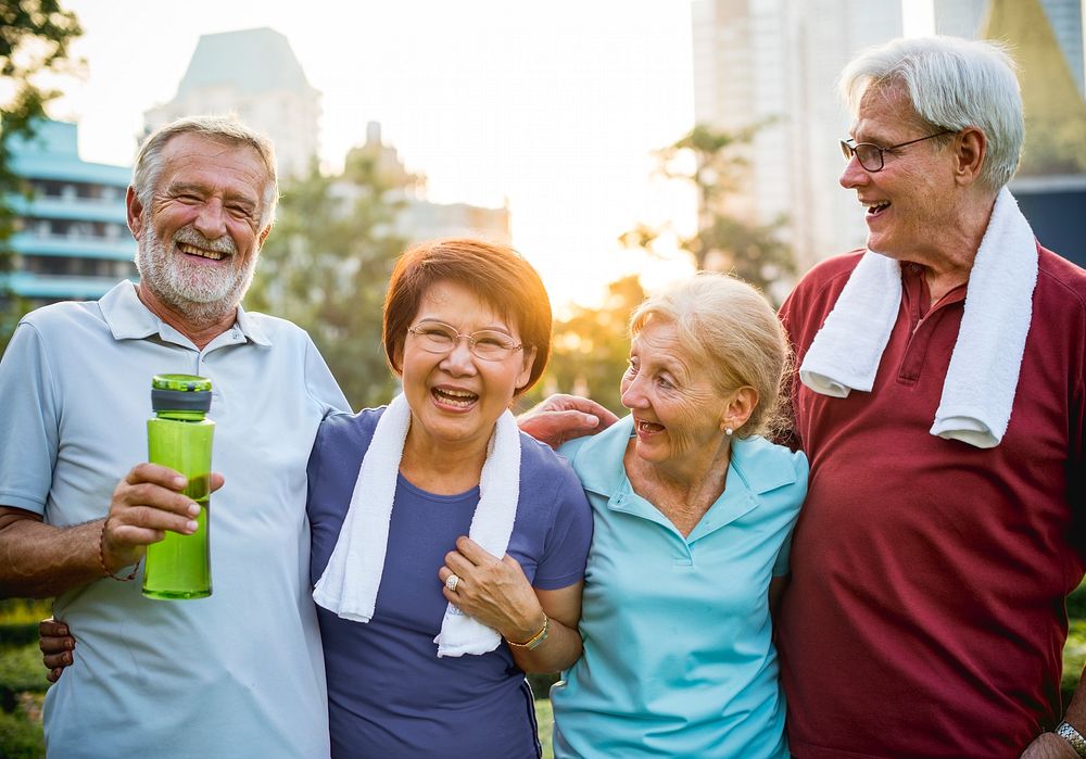 Group of diverse elderly exercise together
