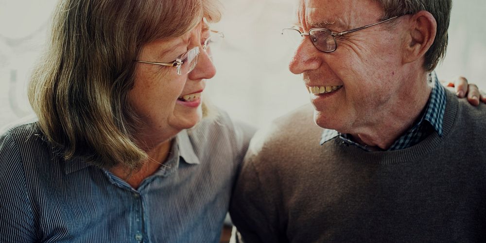 Closeup cheerful portrait of elderly couple